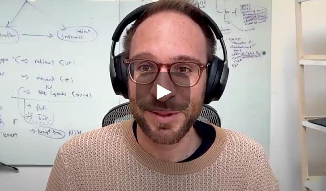 A photo of Sasha Rush wearing headphones